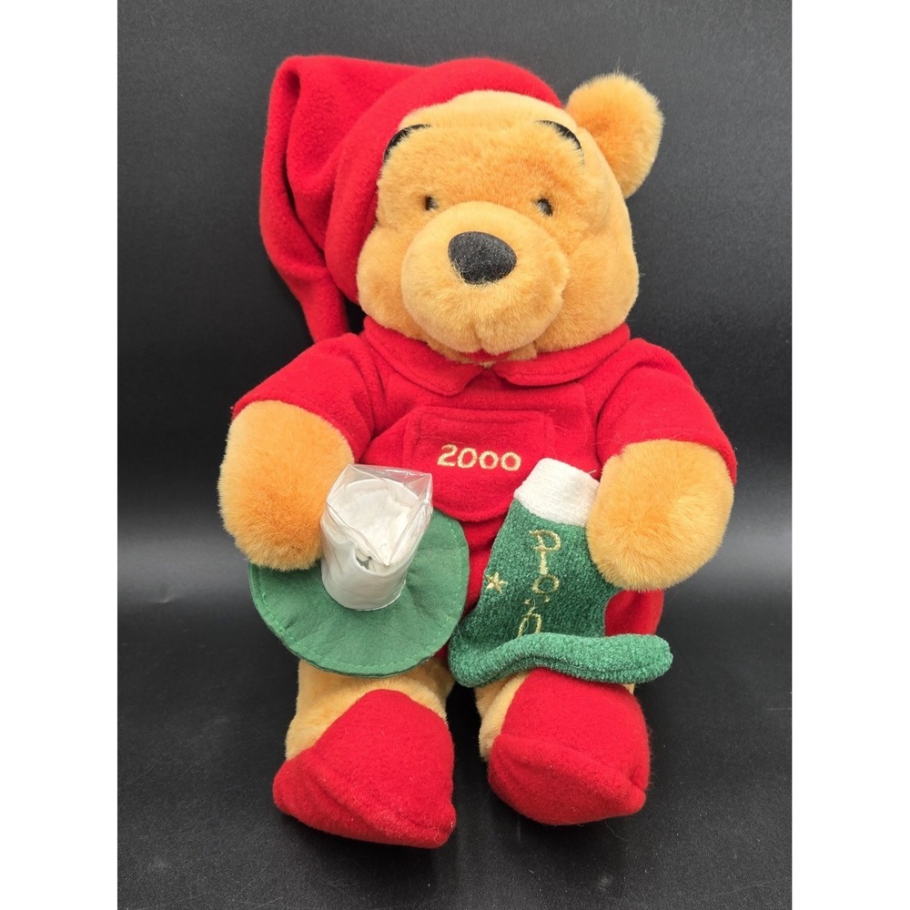 VTG 2000 Disney Store Sleepytime Winnie The Pooh w/ stocking. Reads "2000"
